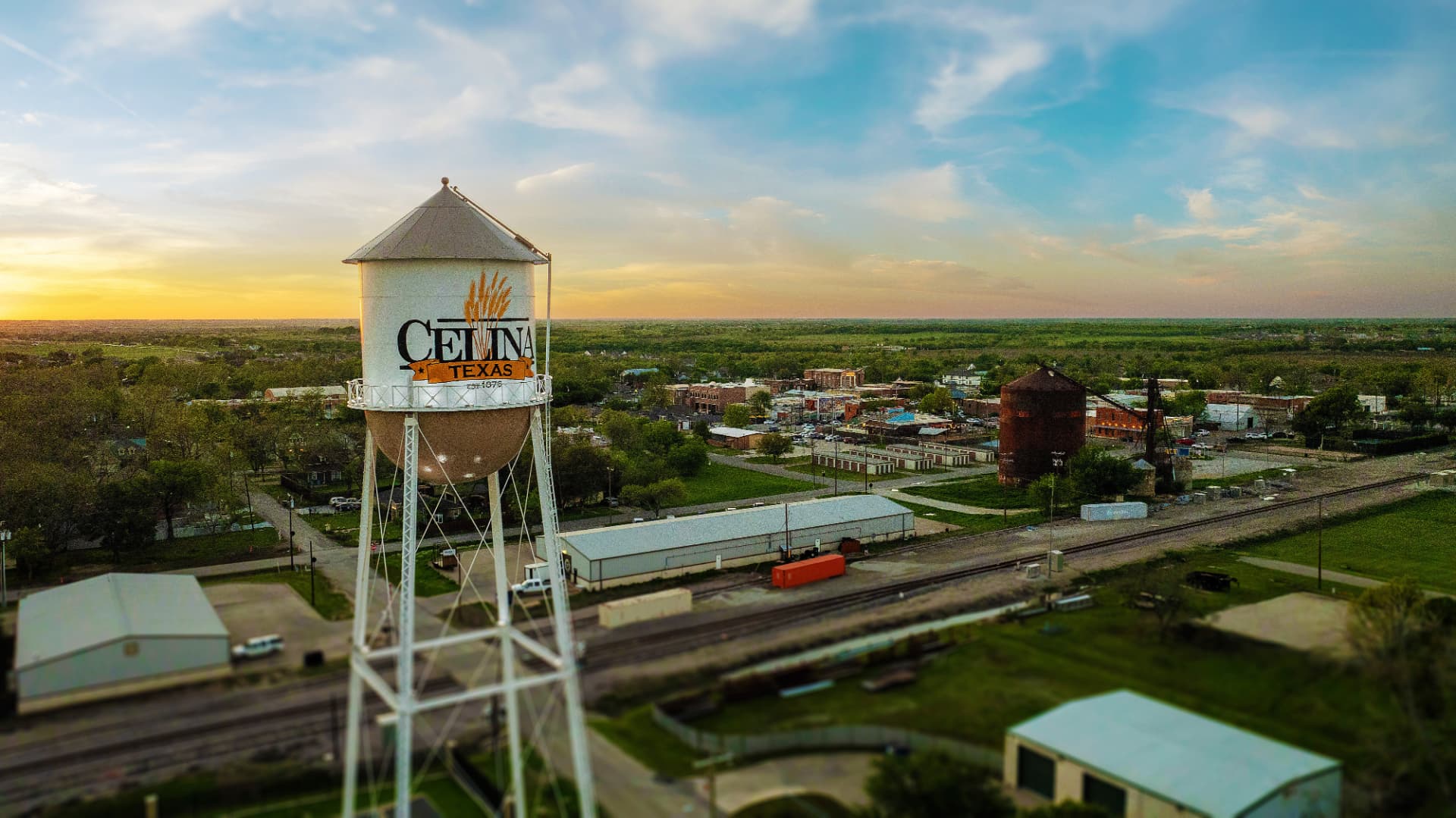 Celina, TX water tower at sunset overlooking downtown