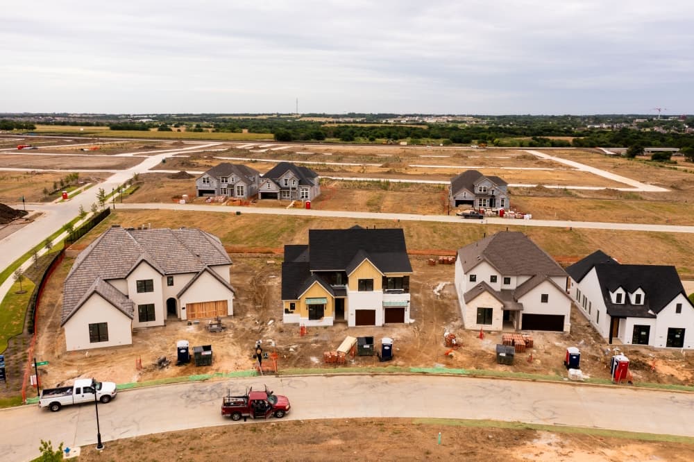 New-construction homes under construction in Uptown Celina, Texas, in The Ranch neighborhood