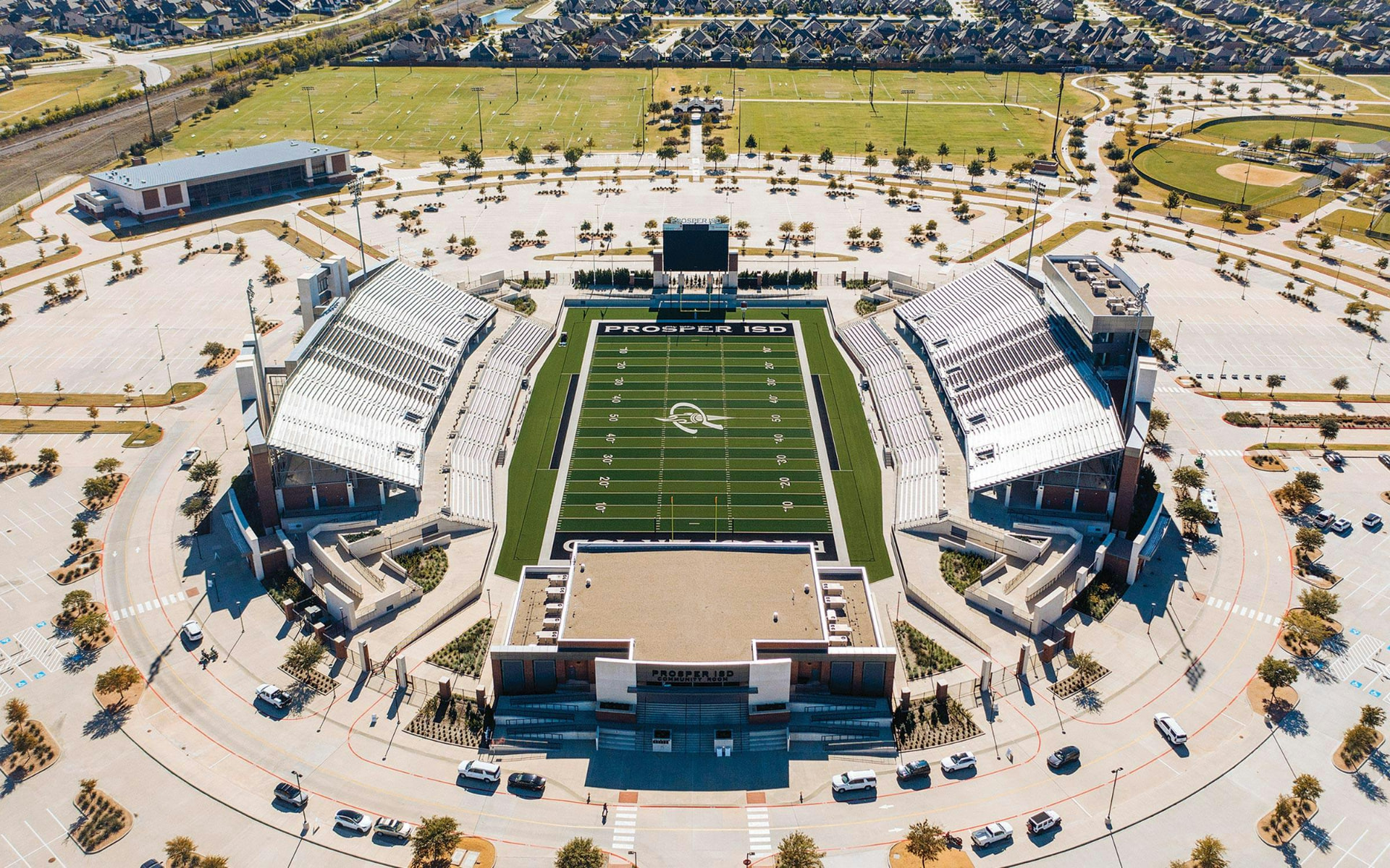 Aerial view of the Prosper ISD stadium and Children's Health Stadium field in Prosper, Texas